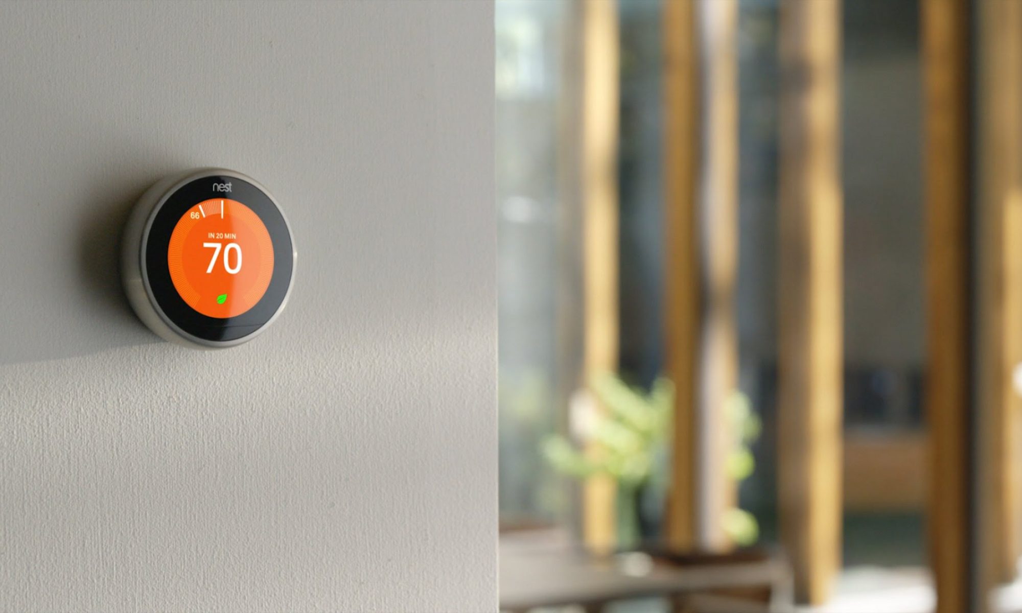 Nest thermostat on wall
